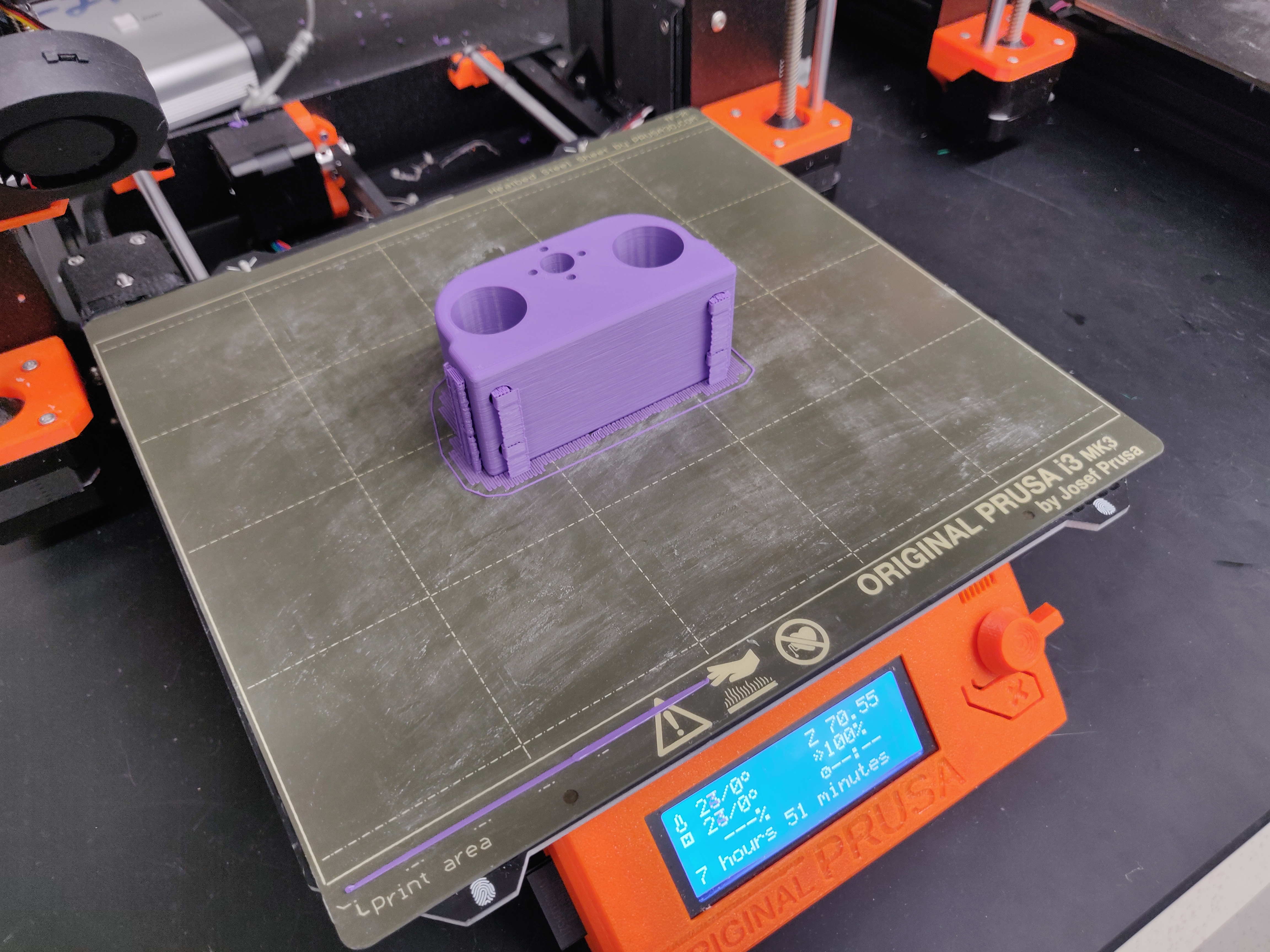 3D printed part laying on print bed