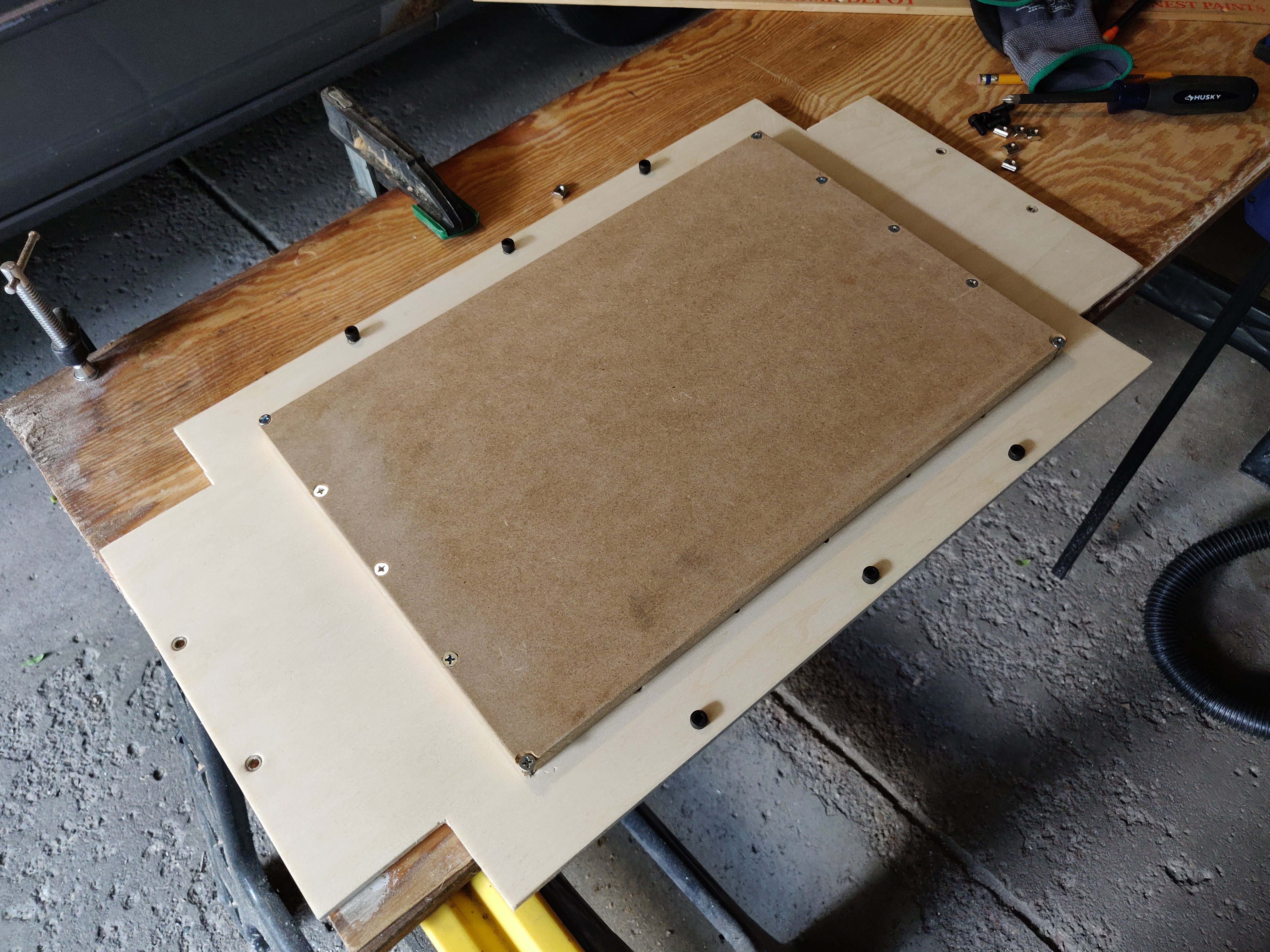 Wasteboard attached to machine plywood base